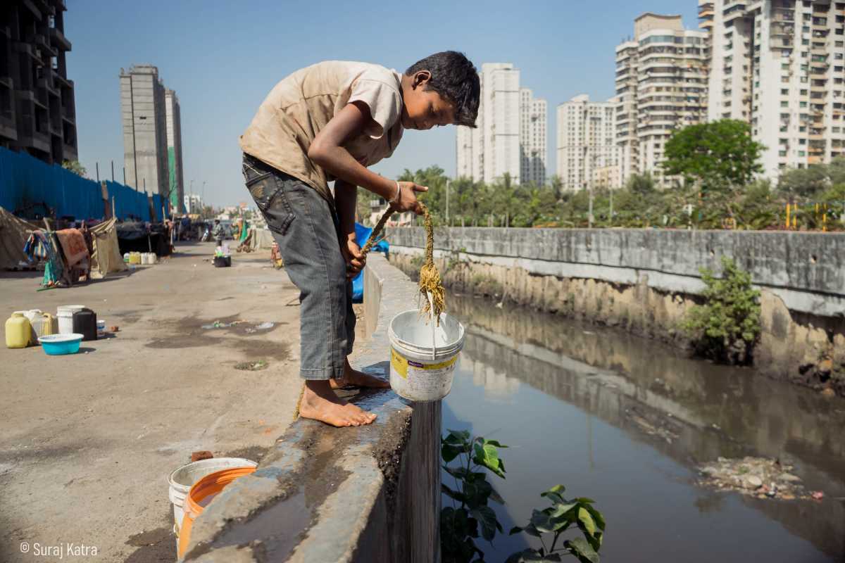 Children too have to miss school and share the burden of collecting water (Image Source: Suraj Katra)