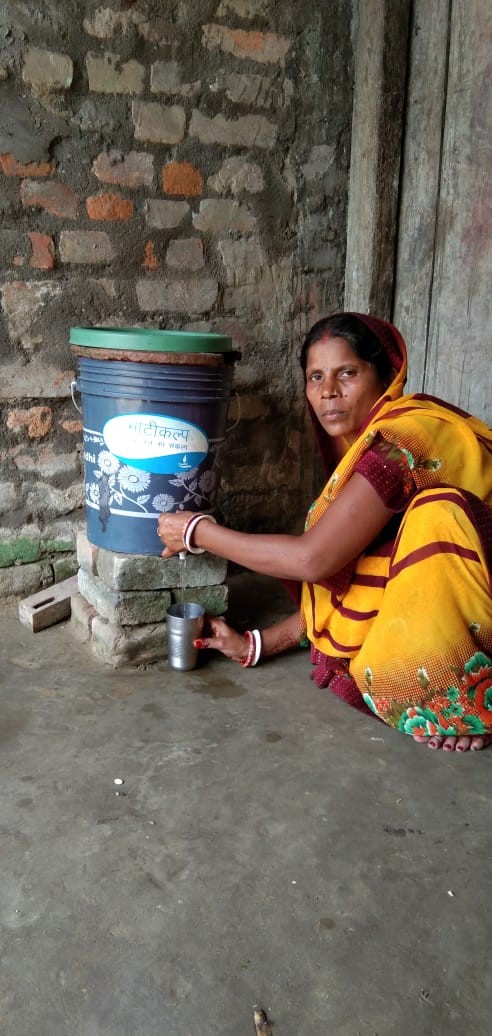 Parmiladevi with her matikalp filter (Image Source: Sehgal Foundation)