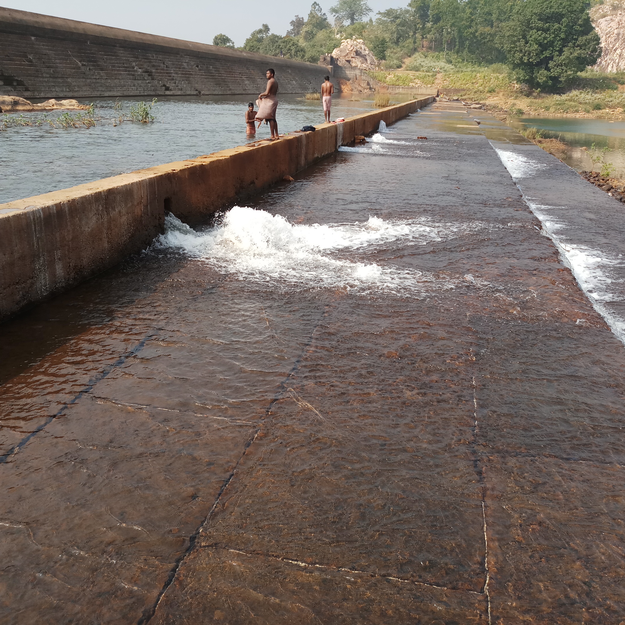 People use the dam water to bathe and wash their cloths now. (Photo courtesy: Gurvinder Singh)