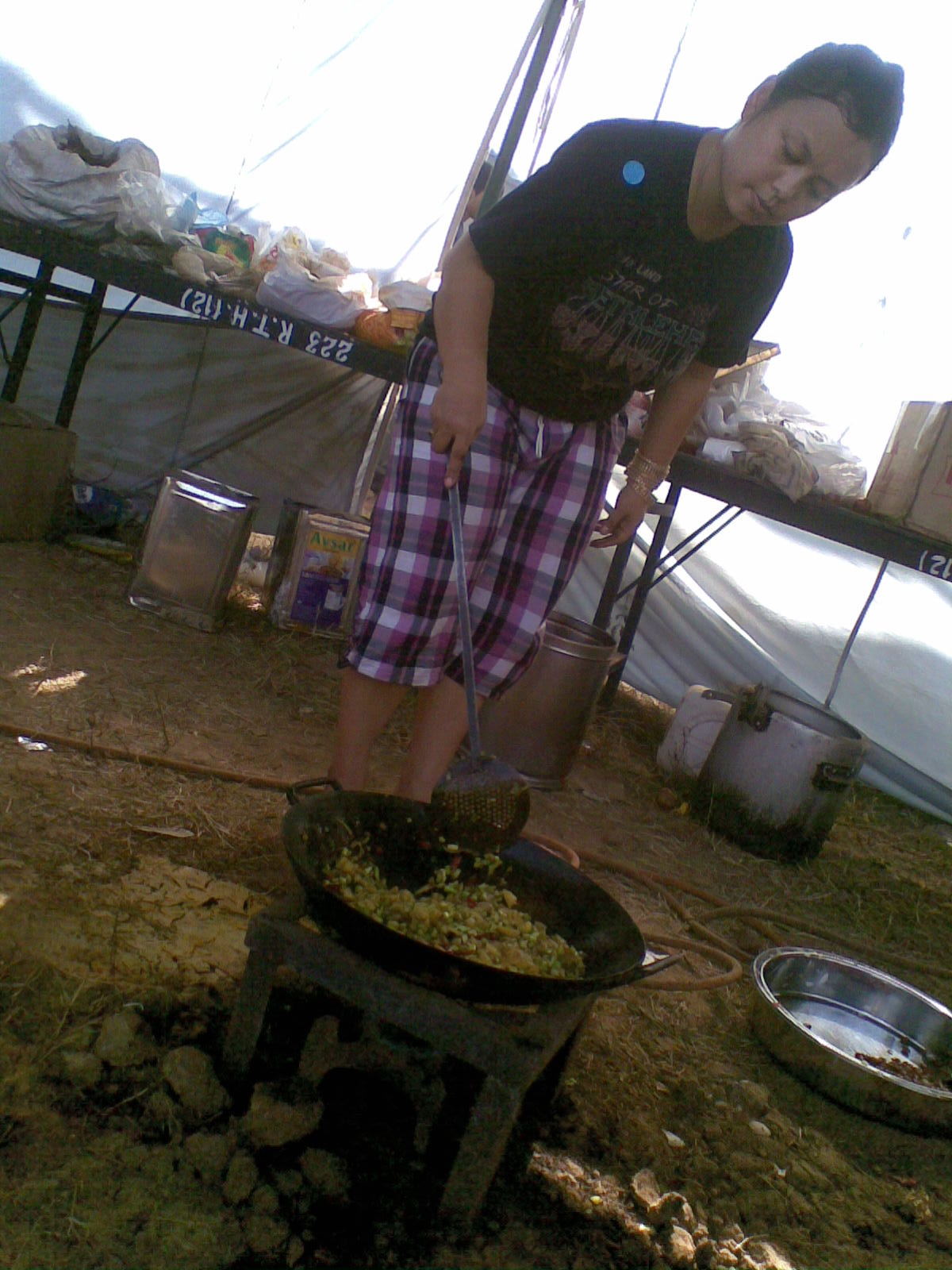 Urmila making a Manipuri sabzi