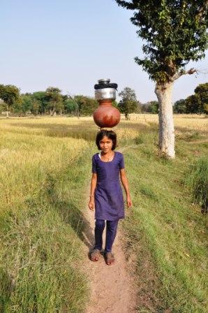 Girl getting water for her home at a village in Shivpuri