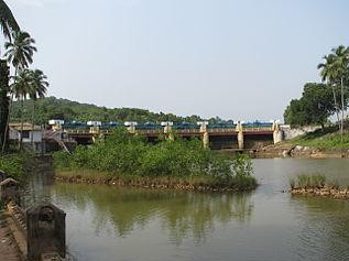A view of the Aruvikkara dam (Source: Wikimedia Commons)