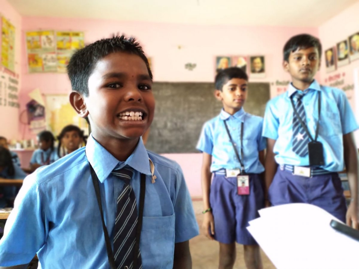 A young boy shows signs of dental fluorosis. Image credit: KarthiK Seshan