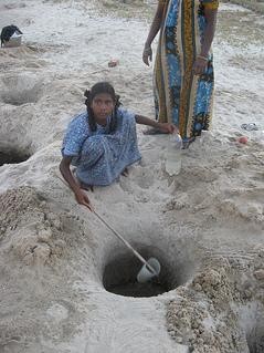 Women collecting water from water holes at Dhanushkodi