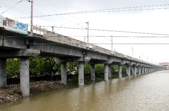 The MRTS' pile foundations severely compromise the water flow in the canal.