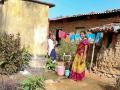 A woman fetching water from the third tap in the house premises. (Image: Ajaya Kumar Behera)