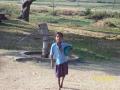 Girl fetching water from handpump (Source: Flickr photos via IWP)