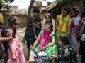 Rubi, Buxar district’s field coordinator for WaterAid India, performs water testing to examine the quality of drinking water in the village of Bicchu Ka Dera, Buxar, India. 25 May 2022. (Image: WaterAid/ Anindito Mukherjee)