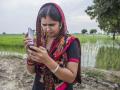 Ruby Mehla, a farmer recieves regular updates on weather and climate smart practices through voice messages on their registered mobile phone in the Climate Smart Village of Anjanthalli. (Image: CCAFS/2014/Prashanth Vishwanathan)