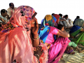 Villagers in Magradeh, Madhya Pradesh watching neighbouring farmers play a game. Image credit: Water Practitioners Network