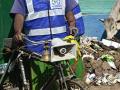 A worker carries household waste to the SLRM centres at Ambikapur.