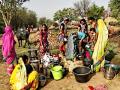 Women in Bametara district of Chattisgarh line up to collect water. Photo credit: Makarand Purohit for India Water Portal