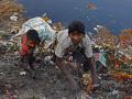 Garbage piled high near the Yamuna river (Source: IWP Flickr Photo)