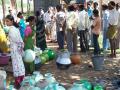 Queuing up for water (Source: IWP Flickr Photos)