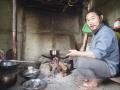 Tenzing Lepcha sits at the hearth of his farmstay. (Pic courtesy: Chicu)