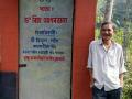 Baghmoria resident Bitul Gogoi poses in front of a newly constructed ‘Daan' toilet donated by Dr Richa Agarwala of Jorhat.