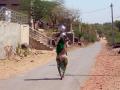 Village women collect water for toilet use. (Photo by India Water Portal)