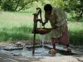Using a handpump to extract groundwater (Source: Wikipedia)