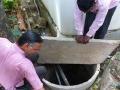 K.P. Singh shows one of the recharge wells 