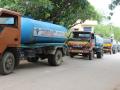 Water tankers queue up to be filled.(Source:SaciWATERs)