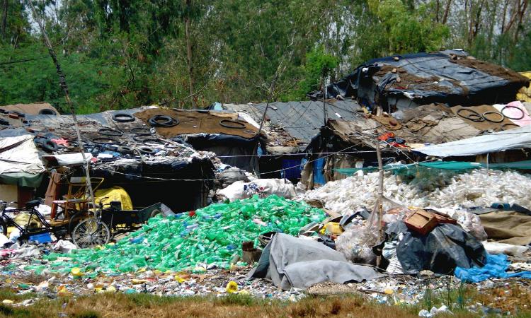 Wastepickers separate recyclable materials from waste at the Ghazipur landfill in Delhi  (Image: Jacqui Kotyk, 2009)