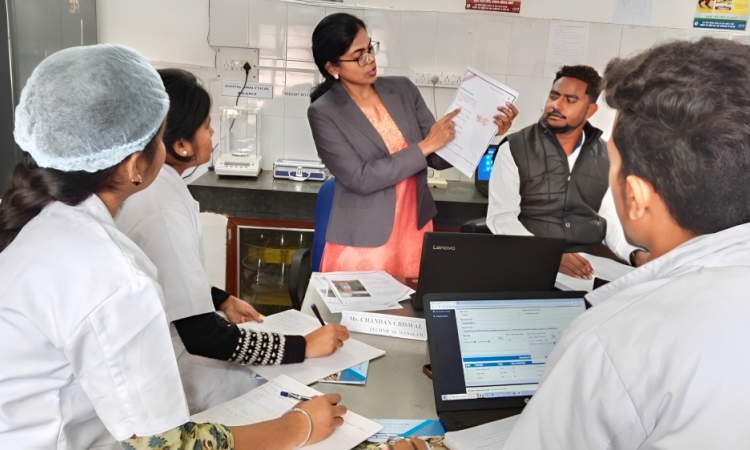 Ms. Chandana Biswal using the Safe Water Learning Cards to train other Chemists and Lab Assistants in her District. (Image: Chandana Biswal)