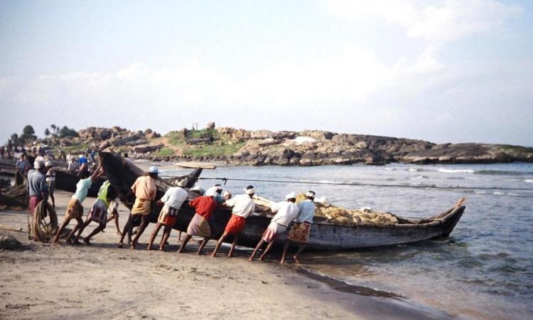 Fishermen venturing out into the sea in Vizhinjham in Kerala (Image Source: India Water Portal)
