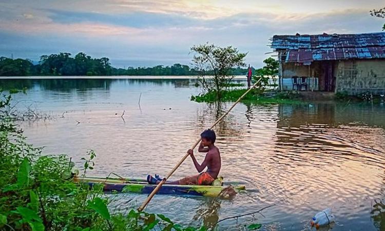 Life during floods in Assam (Image Source: Kausika Bordoloi via Wikimedia Commons)