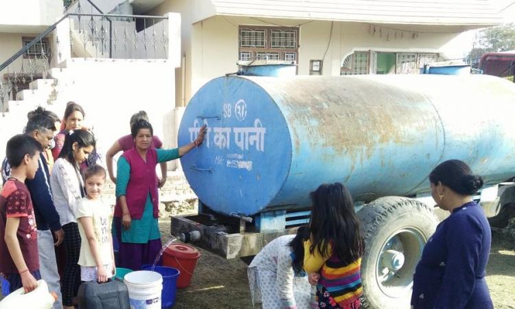 Local women filling water from supply tank