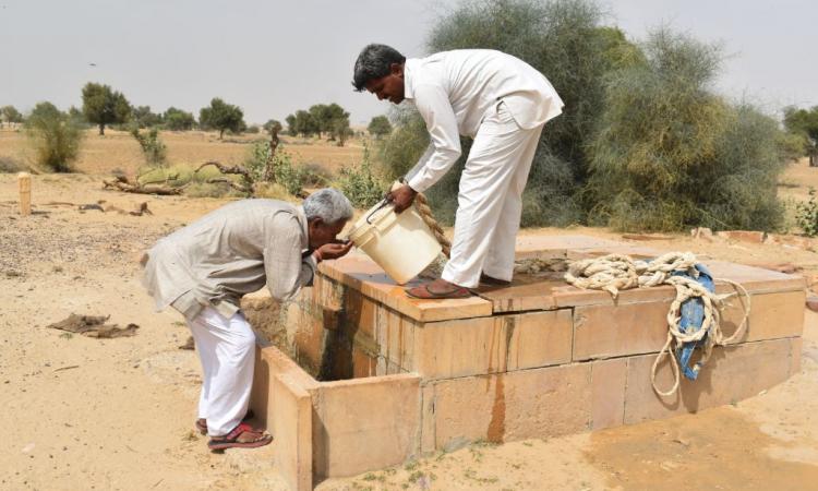 A villager drinking potable water from the Beri (Image: Dileep Bidawat)