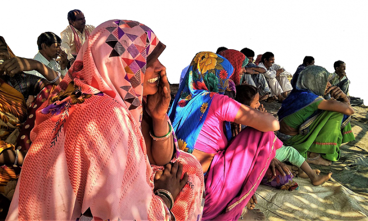 Villagers in Magradeh, Madhya Pradesh watching neighbouring farmers play a game. Image credit: Water Practitioners Network