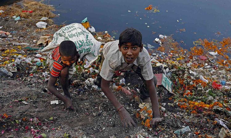 Garbage piled high near the Yamuna river