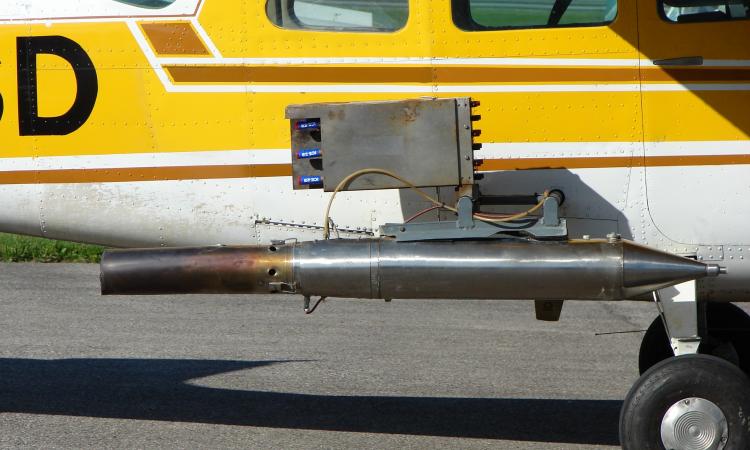 A Cessna 210 with cloud seeding equipment (Source: Wikipedia)