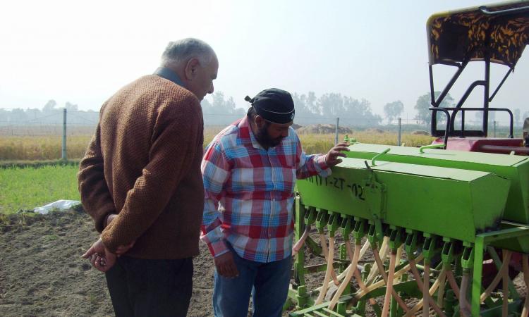 Seed-fertilizer drill in use at Kalwaheri village