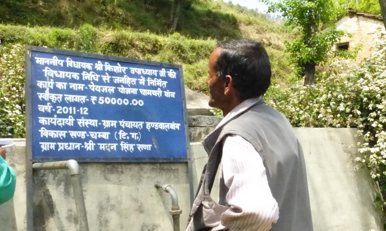 Madan Lal gazes at a water supply scheme