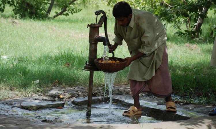Using a handpump to extract groundwater (Source: Wikipedia)