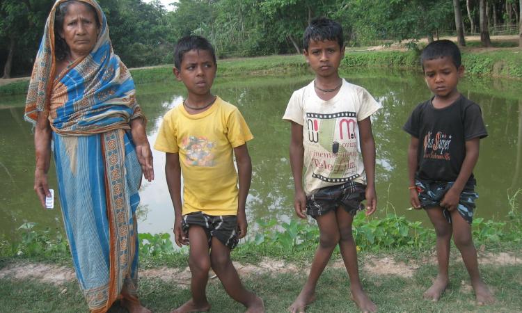 Anjila Khatun and her children of Tapatjuri village in Hojai district suffer from skeletal fluorosis.